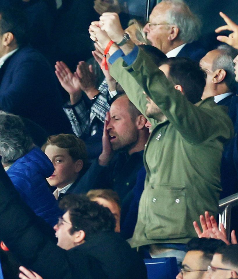 Prince William reacts to a soccer game.
