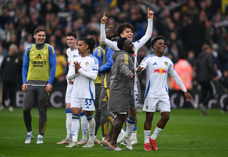Leeds United players celebrating a win.