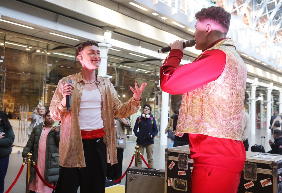 Olly Alexander and his clone performing together.