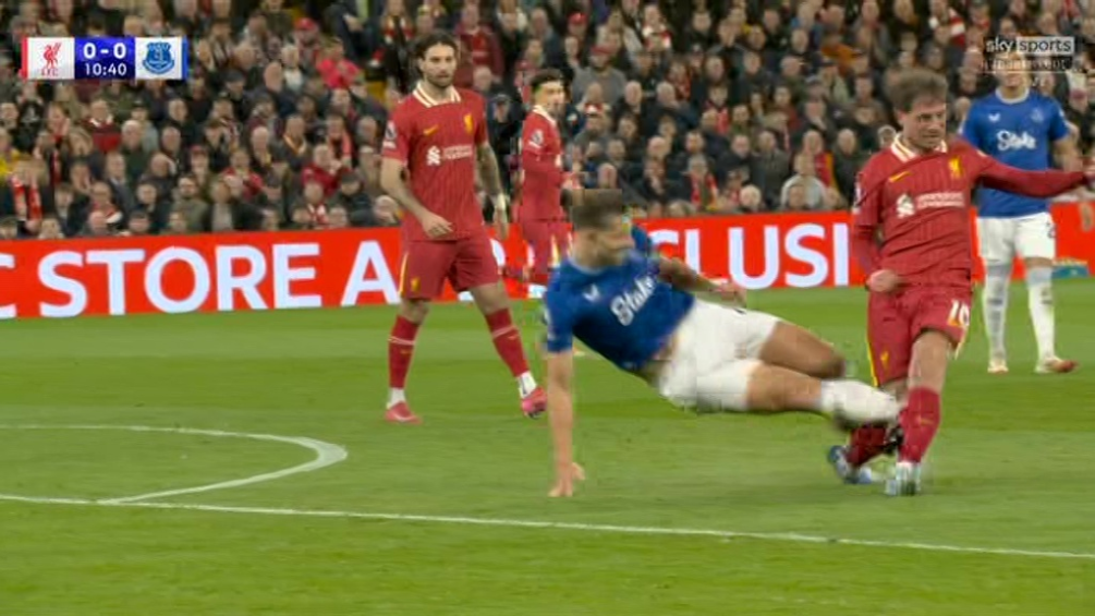 Soccer player sliding tackle.