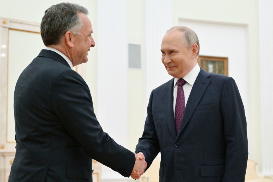 Two men shaking hands.