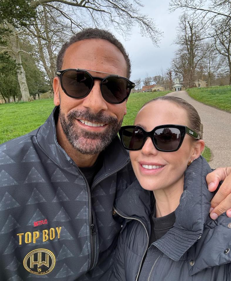 Kate and Rio Ferdinand smiling for a selfie outdoors.