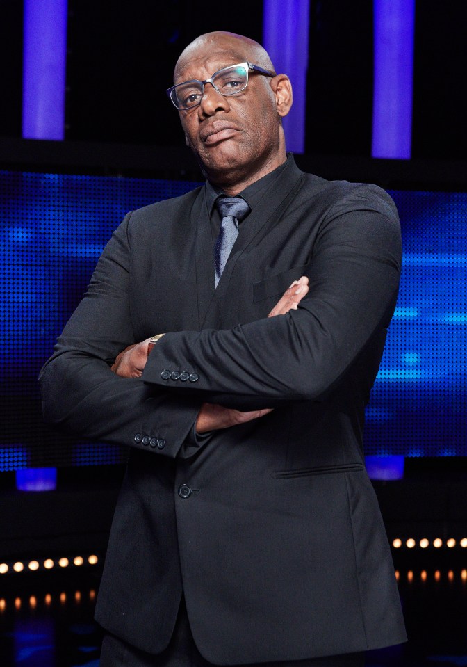 Shaun Wallace, The Chase chaser, arms crossed.