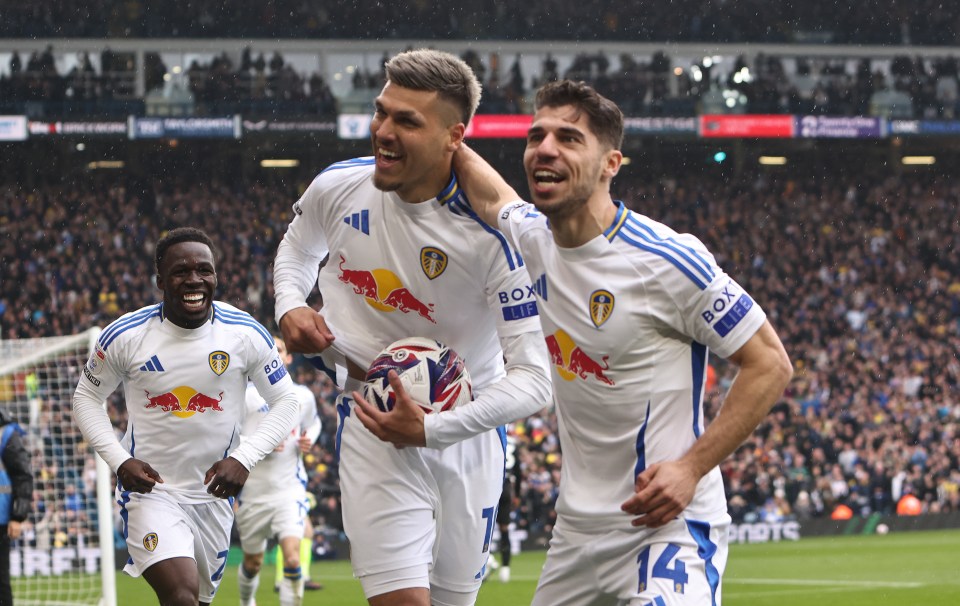 Leeds United players celebrating a goal.