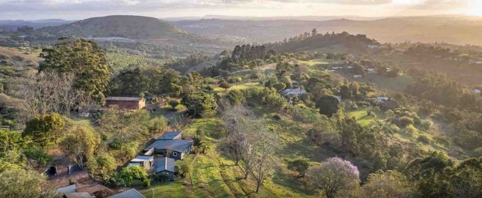 Aerial view of new housing developments in a rural area.