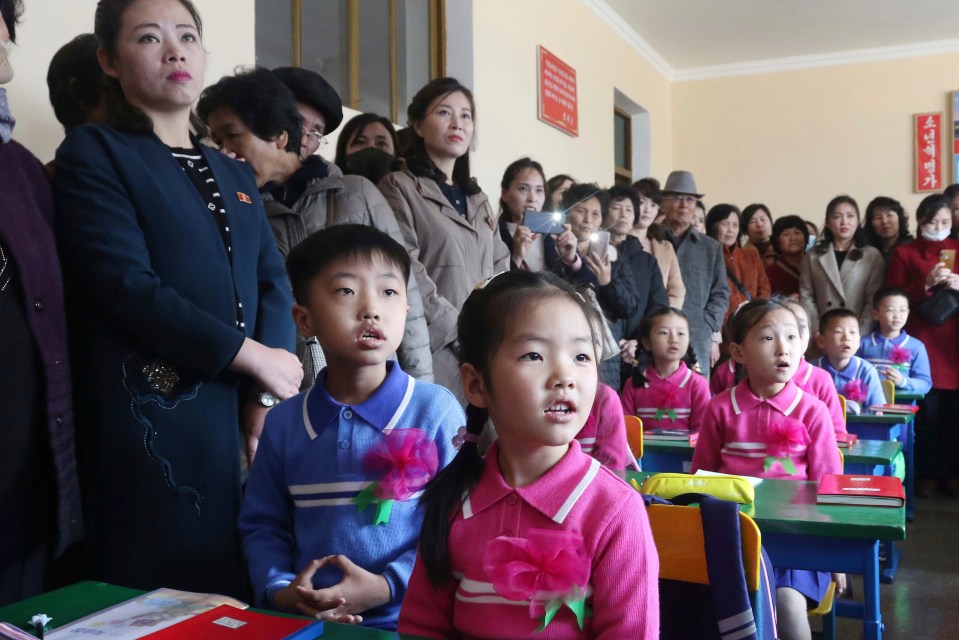 North Korean schoolchildren in their first class.