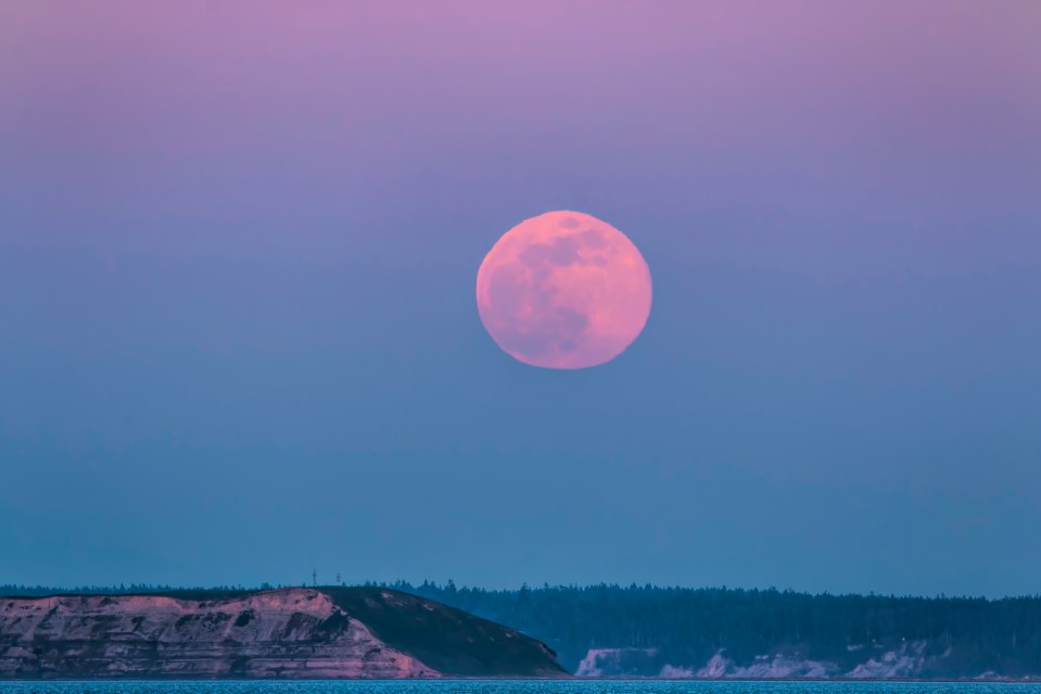 Pink supermoon rising over Protection Island.