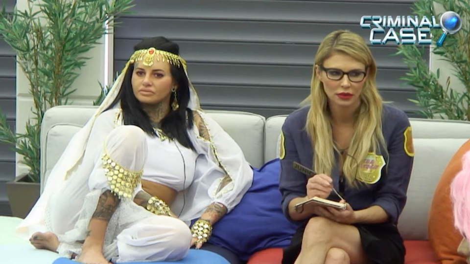 Screenshot of Brandi Glanville and another housemate participating in a "Criminal Case" task on Celebrity Big Brother.