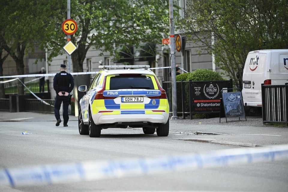 Police car at a crime scene.