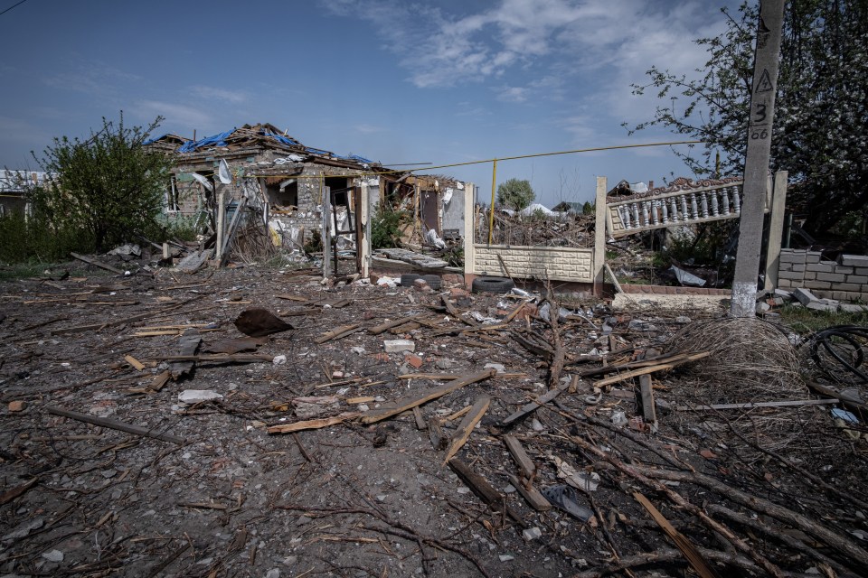 Destroyed buildings and debris in Borova, Ukraine, following Russian shelling.