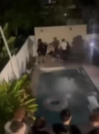 Teens at a trashed Airbnb pool party.