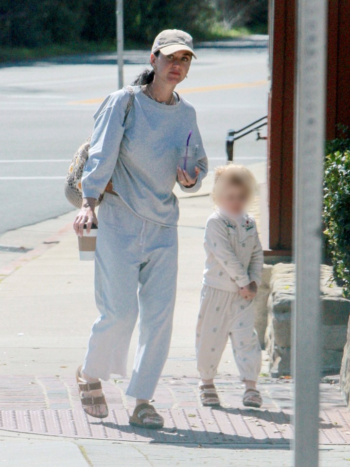 Katy Perry and her daughter leaving a restaurant.