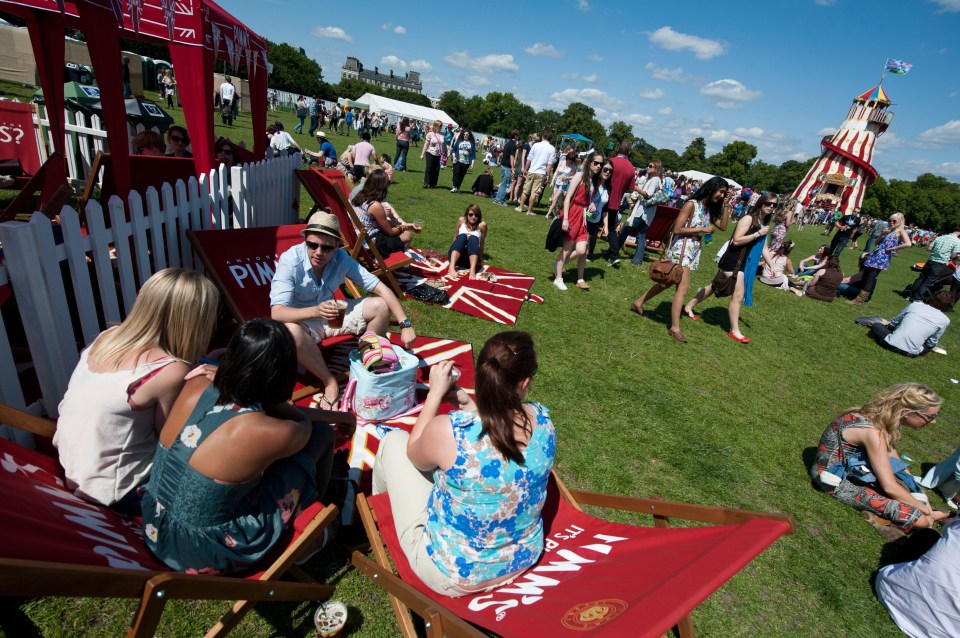 Large crowd enjoying music and free ice cream at a festival.