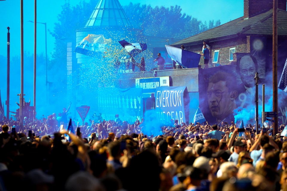 Everton fans celebrating outside Goodison Park.