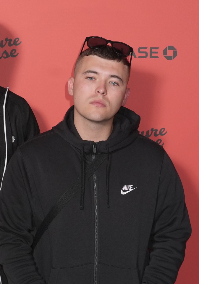 Liam O'Hanna, Kneecap member, charged with terror offence.