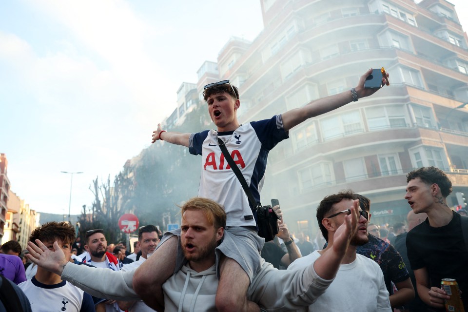 Manchester United fans celebrating in Bilbao, Spain.