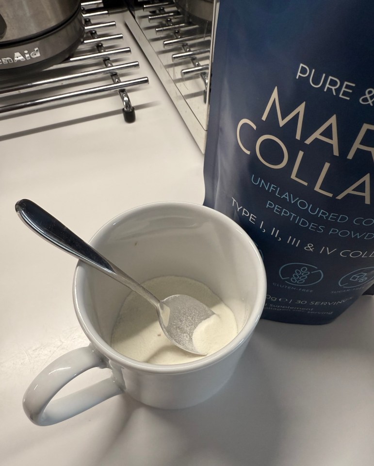 Collagen peptides powder in a mug.