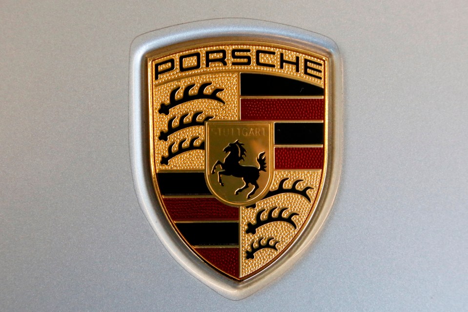 Porsche logo on a car.