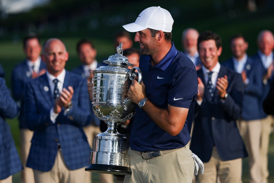 CHARLOTTE, NORTH CAROLINA - MAY 18: Scottie Scheffler of the United States celebrates with the Wanamaker Trophy after winning the 2025 PGA Championship at Quail Hollow Country Club on May 18, 2025 in Charlotte, North Carolina. (Photo by Warren Little/Getty Images)