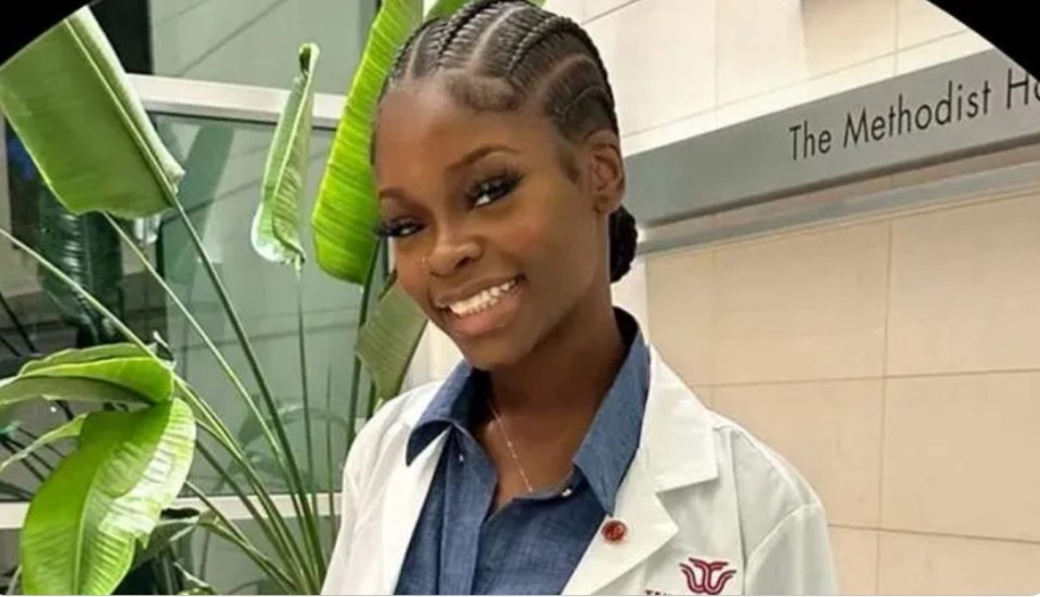 Portrait of Tamilore Odunsi in a white lab coat.