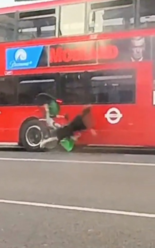 Cyclist crashing into a bus.