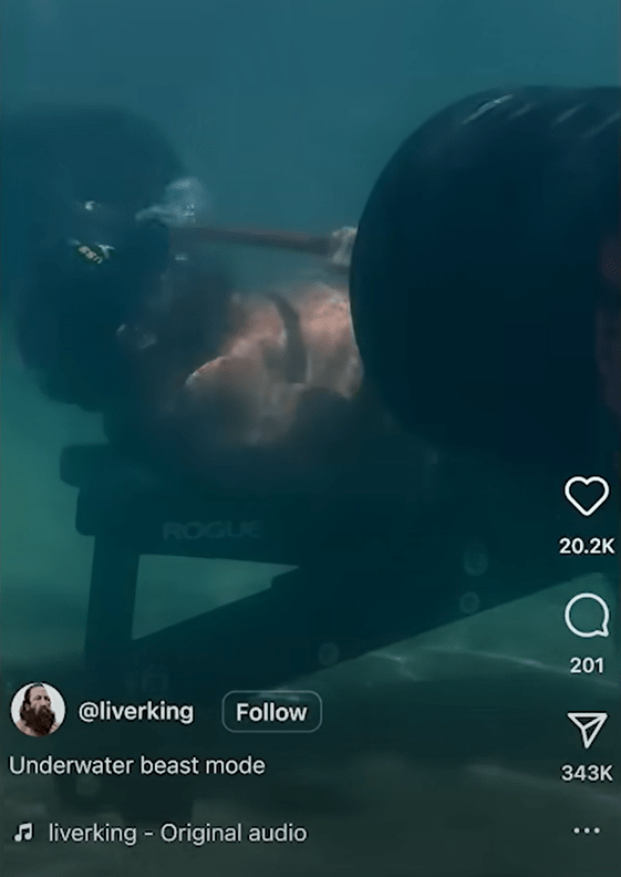 Brian Johnson, also known as Liver King, underwater weightlifting.