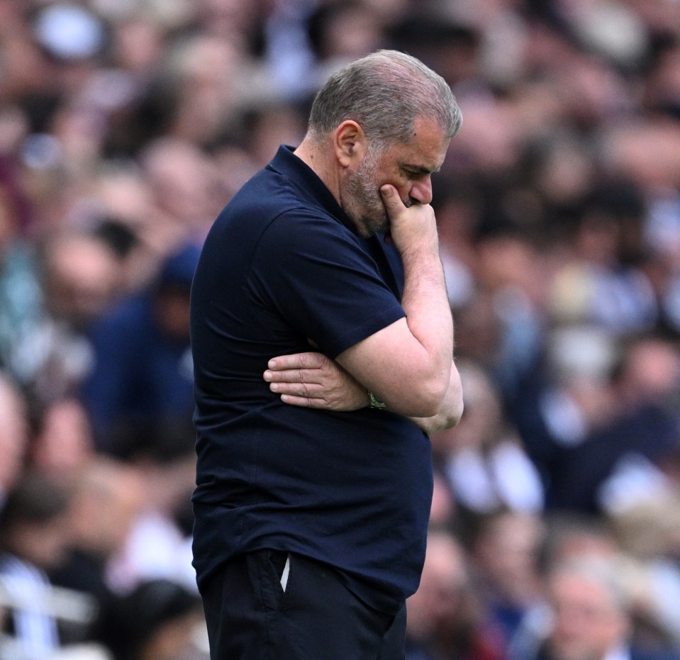 Ange Postecoglou, manager of Tottenham Hotspur, looking pensive during a match.