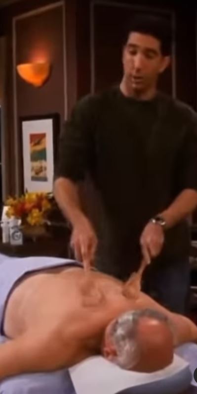 Joey giving someone a back rub.