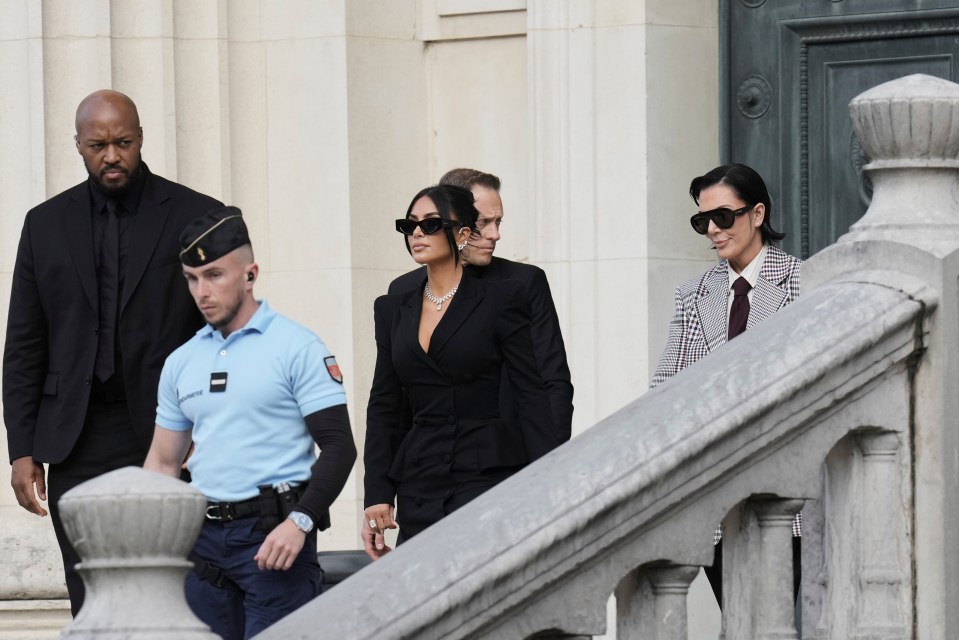 Kim Kardashian and Kris Jenner leaving a courthouse.
