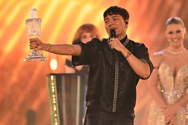 An image collage containing 1 images, Image 1 shows JJ, representing Austria, holds the Eurovision Song Contest trophy