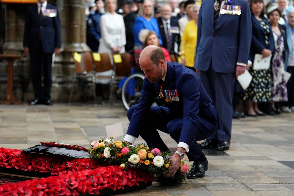 The Prince of Wales laying a wreath at the grave of the Unknown Warrior.