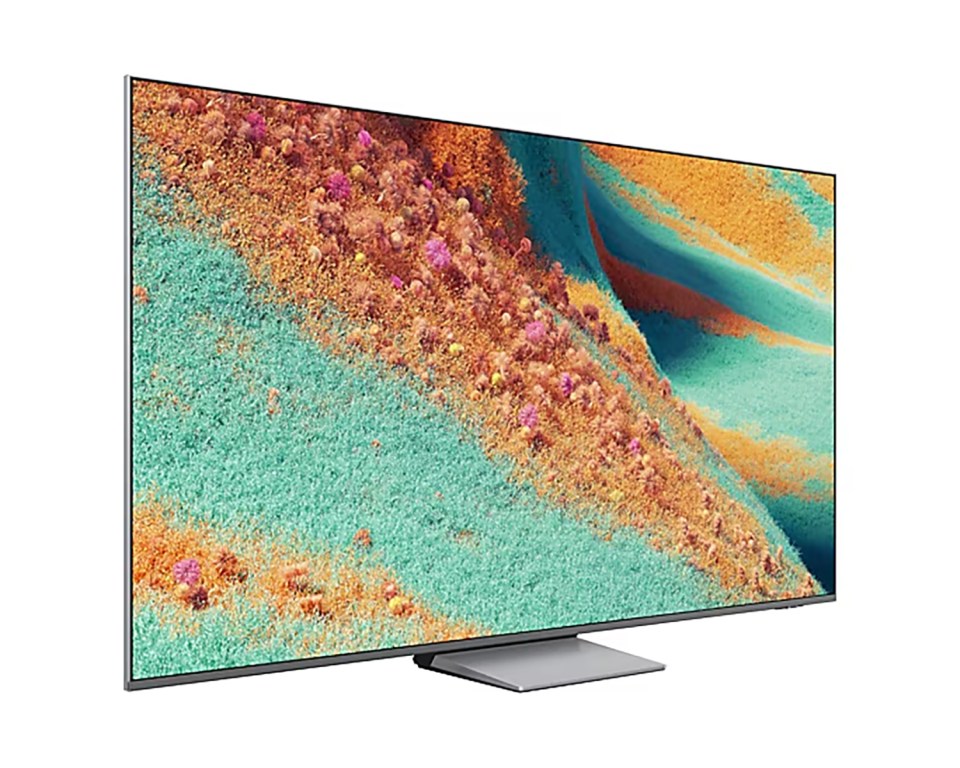 Samsung TV displaying an abstract image of teal and orange landscape.