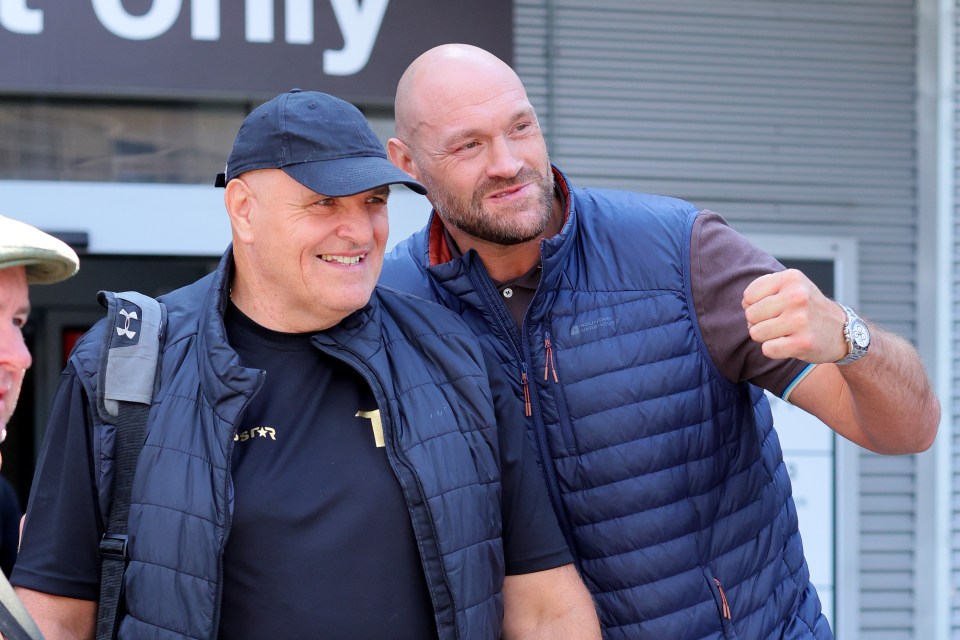 Tyson Fury and his father, John Fury, at Manchester Airport.