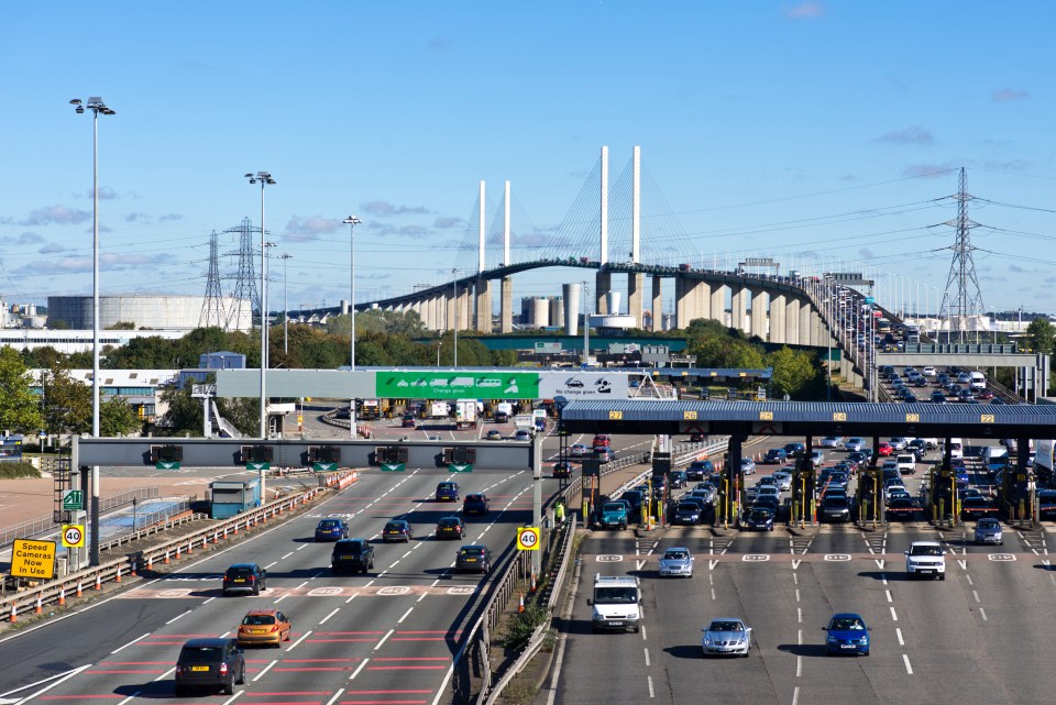 Traffic approaching and departing the QE2 toll bridge.