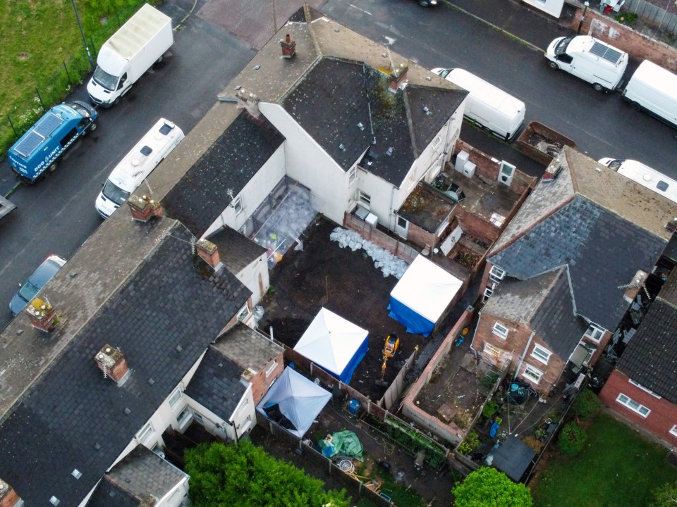 Aerial view of a crime scene at a residential property.