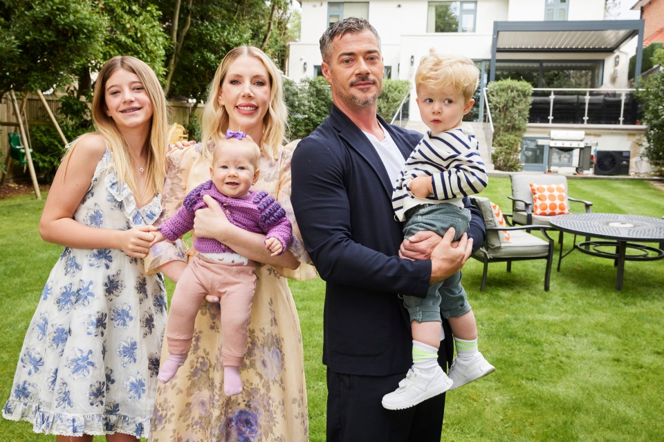 Katherine Ryan with her family in their backyard.